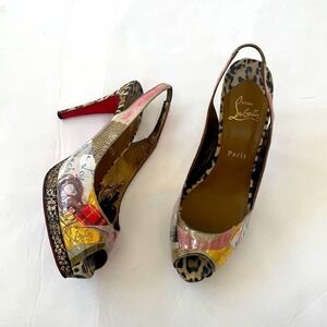Christian Louboutin beige Animal print winter trash PVC coated platform heels 40